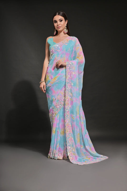 A woman modeling a Firozi-Rama pastel tie-dye saree with sequin and thread embroidery border Glanzavi