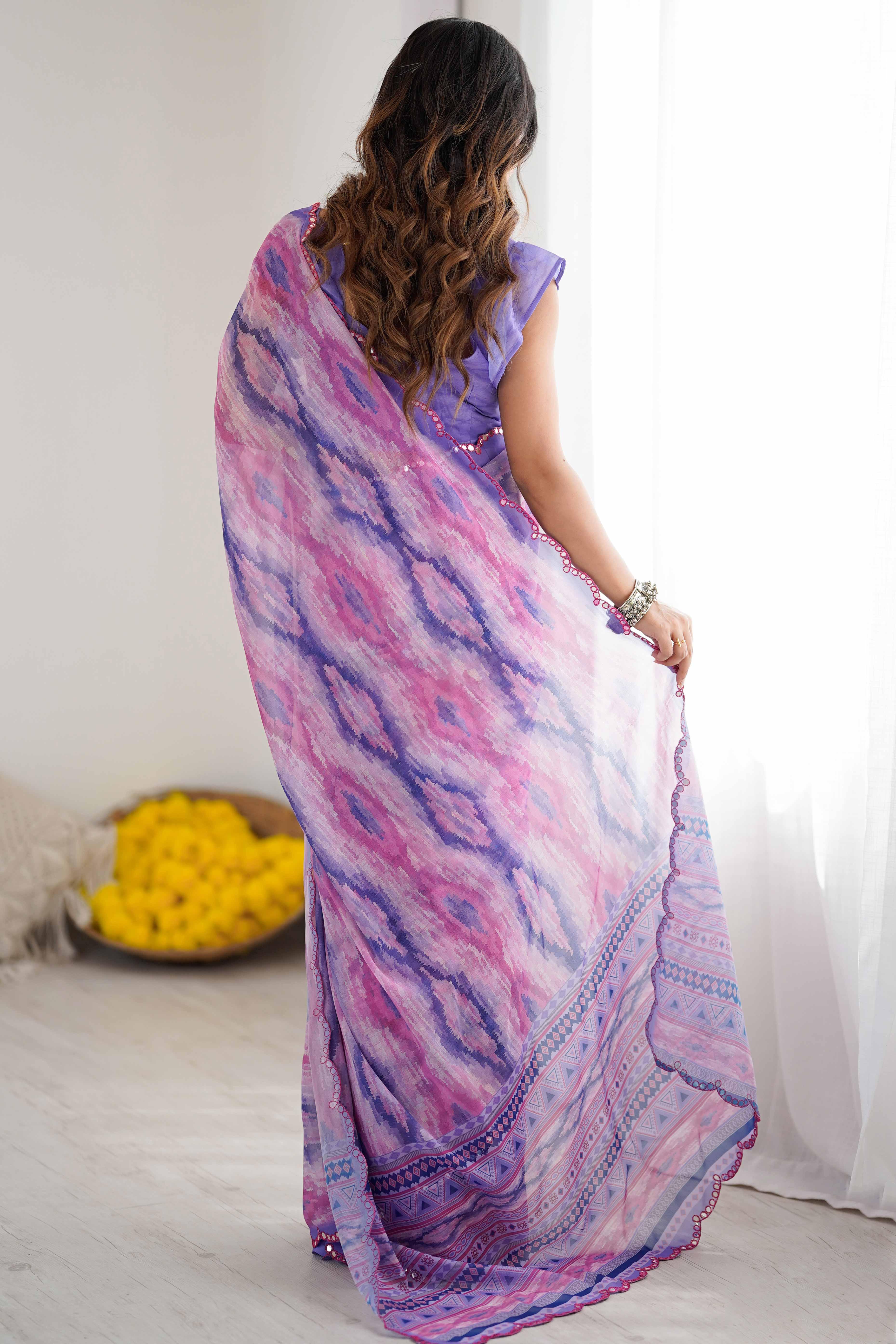 Woman wearing a colorful saree with a white background Glanzavi