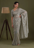 Gray Pleated Georgette Saree with Subtle Golden Zigzag Pattern Minimalist Partywear Saree