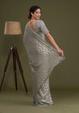 Gray Pleated Georgette Saree with Subtle Golden Zigzag Pattern Minimalist Partywear Saree