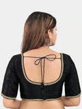 Black blouse with gold embroidery on a white background Glanzavi