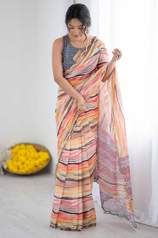 Woman wearing a colorful saree with a white background Glanzavi