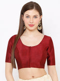 Woman wearing a red blouse against a white background Glanzavi
