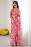 Woman wearing a pink saree with a white background Glanzavi