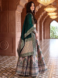 Aarvi Dusty Mauve & Bottle Green Banarasi Silk Lehenga Set with Zari Woven Patterns