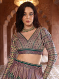 Aarvi Dusty Mauve & Bottle Green Banarasi Silk Lehenga Set with Zari Woven Patterns
