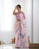 Woman wearing a pink floral saree in a minimalistic setting Glanzavi