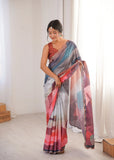 Woman wearing a colorful saree in a bright room Glanzavi