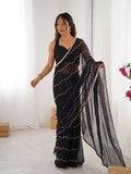 Elegant Black Embellished Georgette Saree with Golden Trim