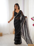 Elegant Black Embellished Georgette Saree with Golden Trim