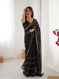 Elegant Black Embellished Georgette Saree with Golden Trim