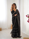 Elegant Black Embellished Georgette Saree with Golden Trim