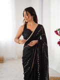 Elegant Black Embellished Georgette Saree with Golden Trim