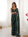Elegant Green Embellished Georgette Saree with Golden Trim