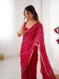 Elegant Pink Embellished Georgette Saree with Golden Trim