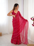 Elegant Pink Embellished Georgette Saree with Golden Trim