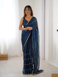 Elegant Teal Blue Embellished Georgette Saree with Golden Trim
