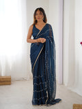 Elegant Teal Blue Embellished Georgette Saree with Golden Trim
