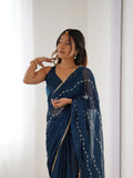 Elegant Teal Blue Embellished Georgette Saree with Golden Trim