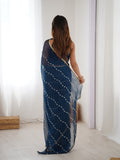 Elegant Teal Blue Embellished Georgette Saree with Golden Trim