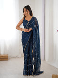 Elegant Teal Blue Embellished Georgette Saree with Golden Trim