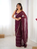 Elegant Wine Embellished Georgette Saree with Golden Trim