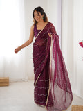 Elegant Wine Embellished Georgette Saree with Golden Trim
