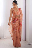 Woman wearing a floral saree with a white background Glanzavi