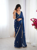 Flora Teal Blue Floral Embellished Net Saree with Gold Border