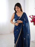 Flora Teal Blue Floral Embellished Net Saree with Gold Border