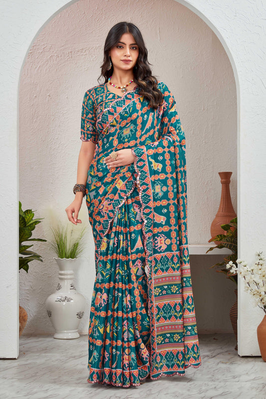 Woman wearing a colorful saree in an indoor setting with decorative elements Glanzavi