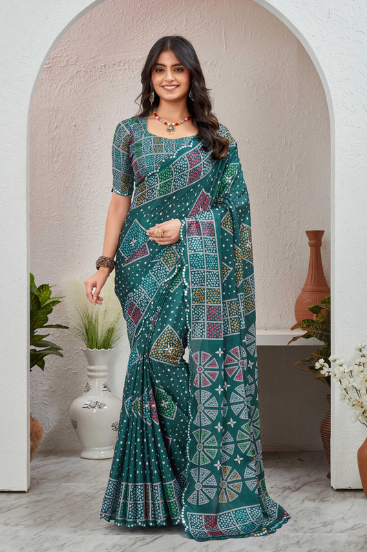 Woman wearing a green saree with a pattern in an indoor setting Glanzavi