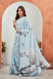 Elegant Sky Blue Floral Printed Saree with Polka Dot Blouse