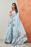 Elegant Sky Blue Floral Printed Saree with Polka Dot Blouse