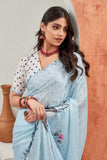 Elegant Sky Blue Floral Printed Saree with Polka Dot Blouse