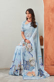 Elegant Sky Blue Printed Georgette Saree with Clock and Floral Design