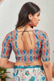Cream Multicolor Printed Saree with Ethnic Motif and Tribal Border