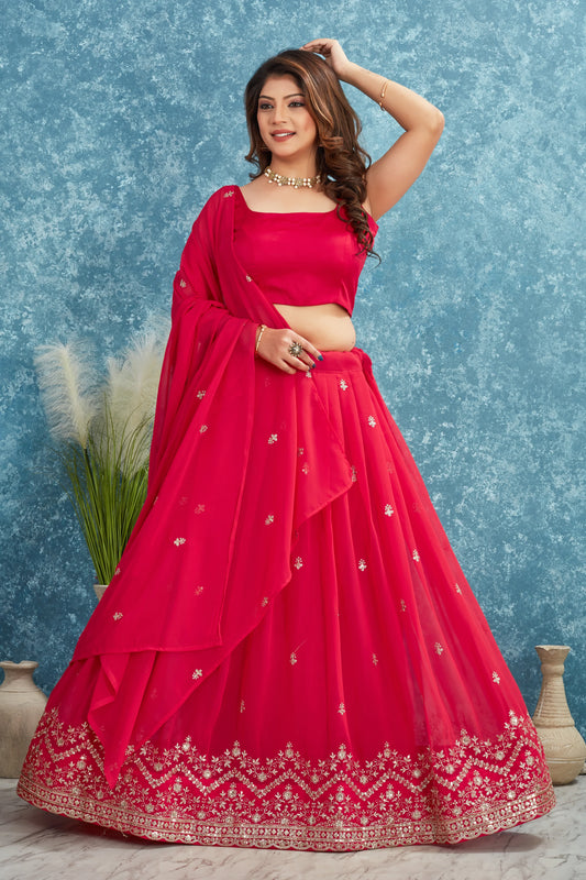 Woman wearing a red traditional outfit with a blue textured background Glanzavi