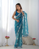 Petrol Blue Organza Saree with Floral Embroidered Border – Premium Ethnic Wear