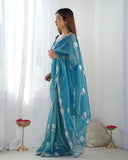 Petrol Blue Organza Saree with Floral Embroidered Border – Premium Ethnic Wear