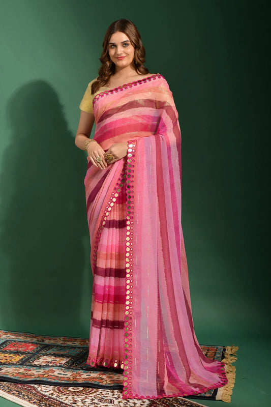 Woman wearing a pink saree with a green background Glanzavi