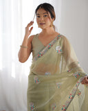 Elegant Pista Green Organza Saree with Embroidered Floral Border