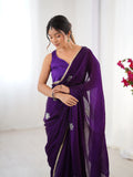 Star Purple Georgette Saree with Silver Floral Embellishments and Gold Border