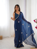 Star Teal Blue Georgette Saree with Silver Floral Embellishments and Gold Border