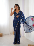 Star Teal Blue Georgette Saree with Silver Floral Embellishments and Gold Border