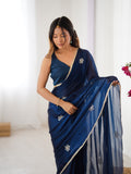 Star Teal Blue Georgette Saree with Silver Floral Embellishments and Gold Border