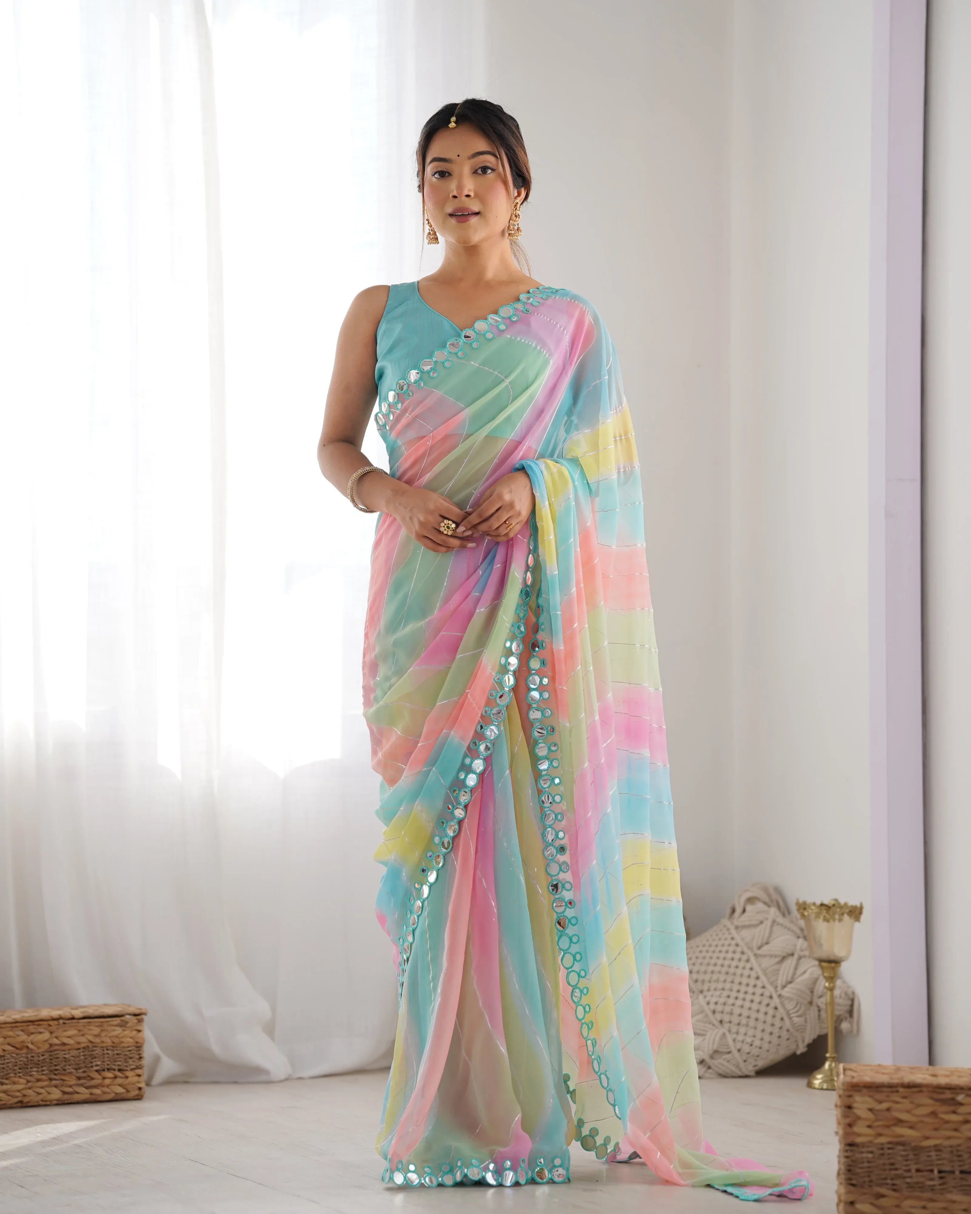 Woman wearing a colorful saree with a white background Glanzavi