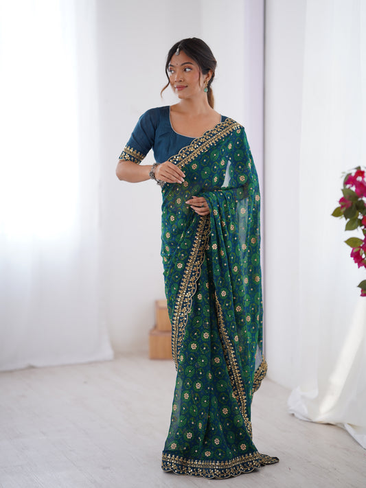 Teal Blue Printed Georgette Saree Gold Embroidered Border