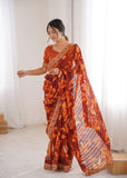 Orange Printed Georgette Saree | Gold Embroidered Border