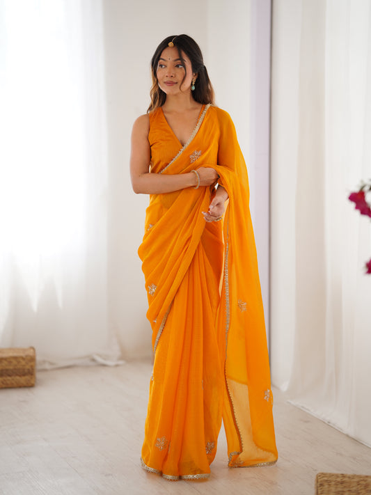 Star Yellow Georgette Saree with Silver Floral Embellishments and Gold Border